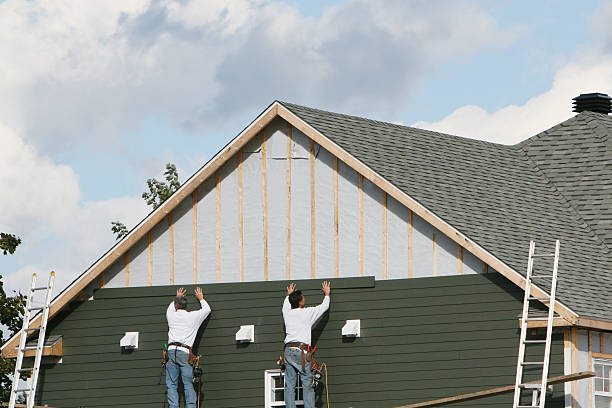Professional Emergency Siding Repair technician working in Patchogue, NY